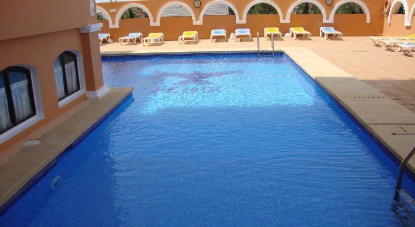 AMPLIA VIVIENDA NEW para12 pers a 4 min caminando de PLAYA con Terraza, Piscina Com, Wifi, Ventiladores de techo, Lavavajillas Roquetas de Mar Exterior foto